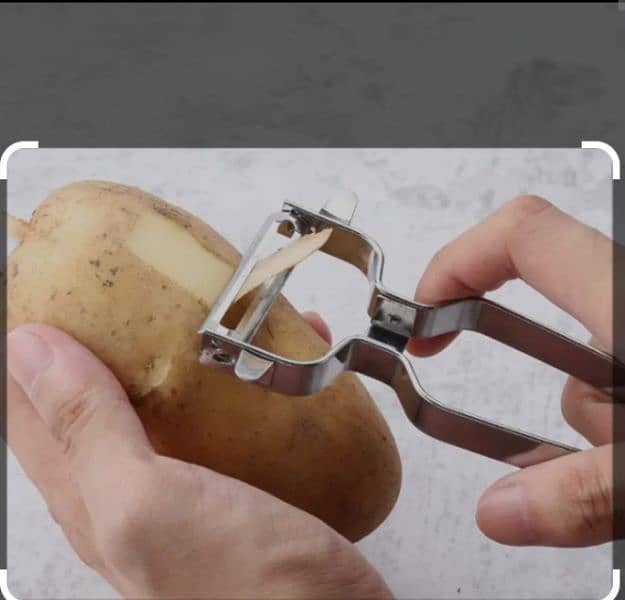 PEELER A KITCHEN TOOL FOR PEELING FRUITS AND VEGTABLES 8