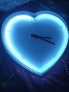The Perfect Gift: Blue Light Wall Clock with Built-in Charger