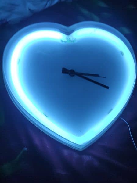The Perfect Gift: Blue Light Wall Clock with Built-in Charger 0