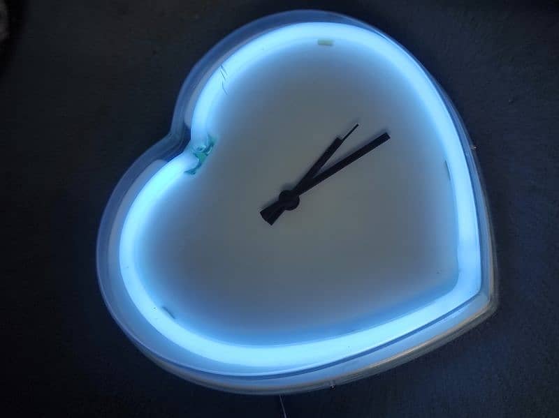 The Perfect Gift: Blue Light Wall Clock with Built-in Charger 1