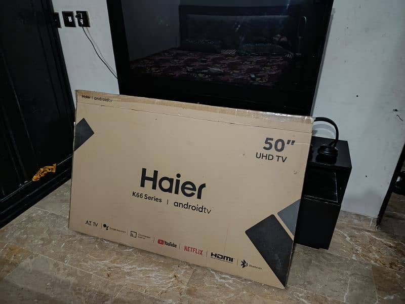 Haier 50" 4k led tv with led console 0