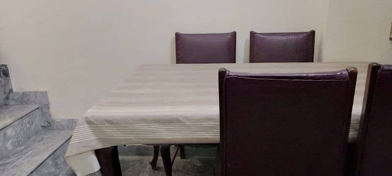 beautiful dining table and six ledar Cover chairs 5