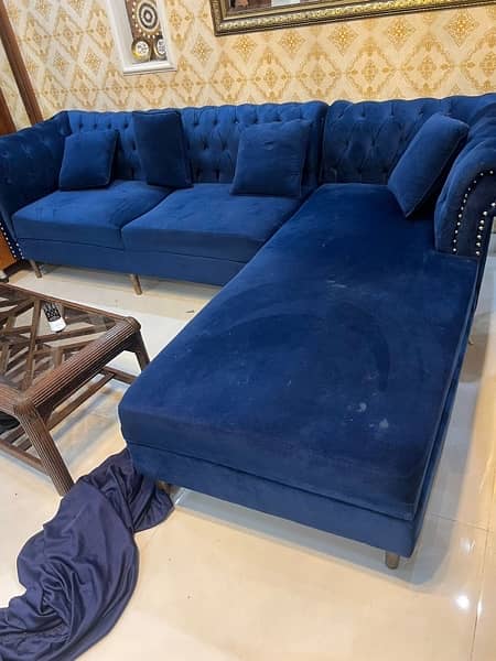 sofa l shaped in blue colour 0