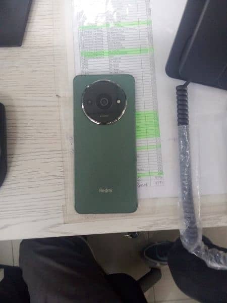 Redmi A3 (4+4/64)Mate green colour after one day use 6