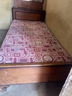 single wooden beds
