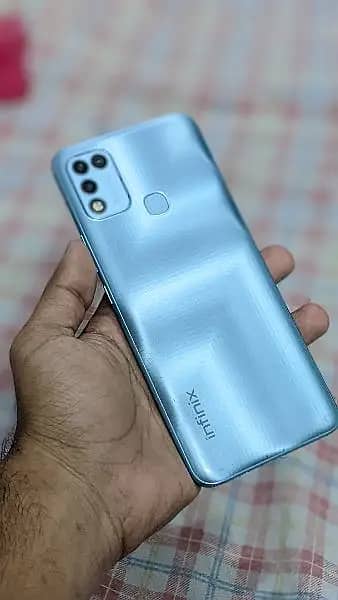 infinix hot 10 play home used just left top corner sy colour thora 1