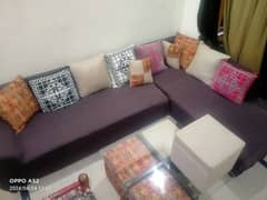 7 seater L shaped Sofa Set with dewan 4 stool and a glass table