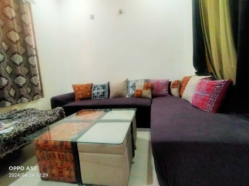 7 seater L shaped Sofa Set with dewan 4 stool and a glass table 2