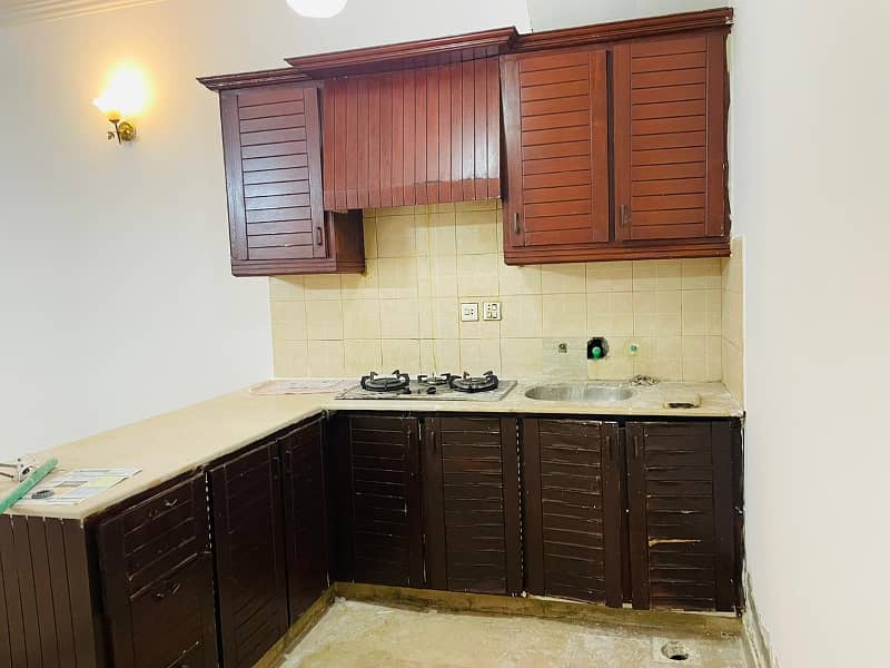 F-11 Markaz 1 Bedroom 1 Bath Tv Lounge Kitchen Car Parking Apartment Available For Sale In Islamabad 3