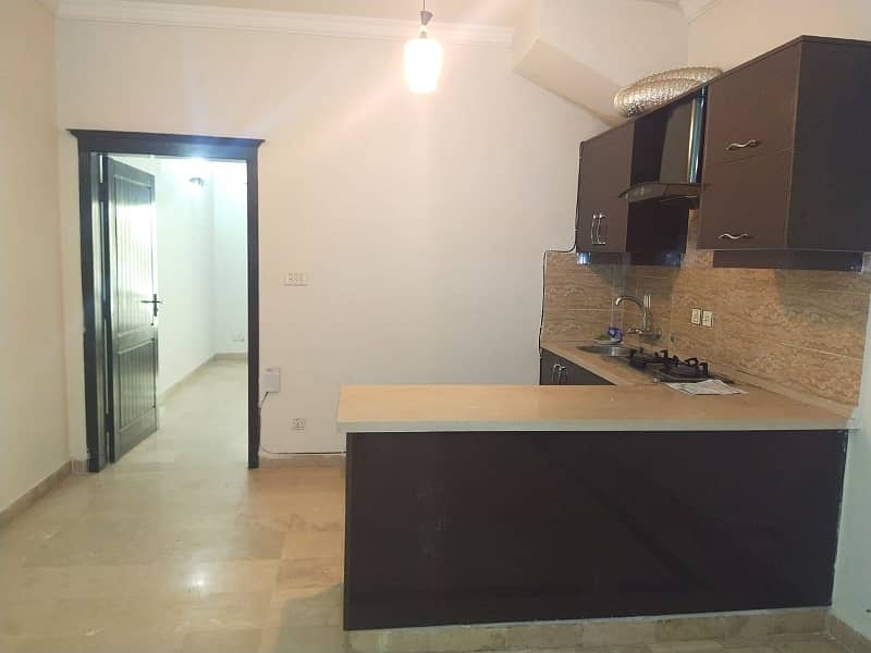 F-11 Markaz 1 Bed 1 Bath with Tv Lounge Kitchen Car Parking Available for Sale 1