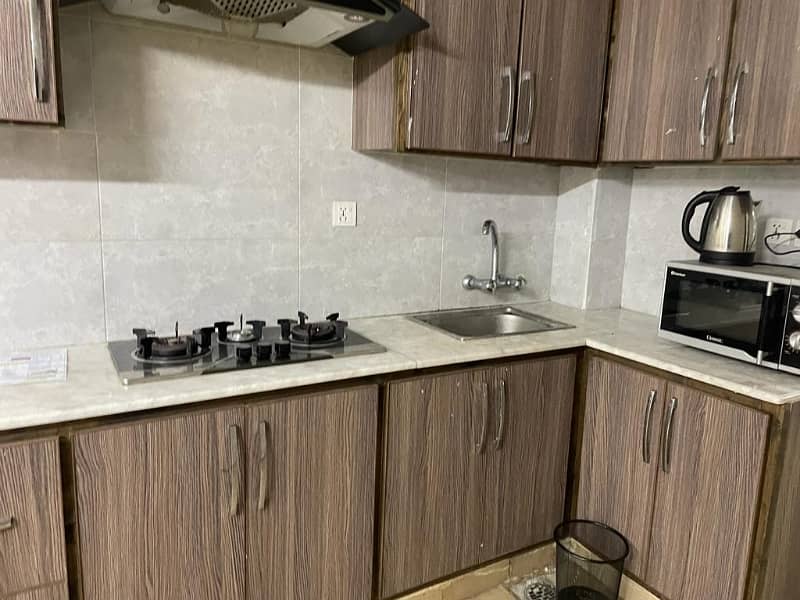 F-11 Markaz Beautiful Fully Renovated 1 Bed 1 Bath Tv Lounge Kitchen Car Parking Fully Furnished Apartment Available On Rent 6