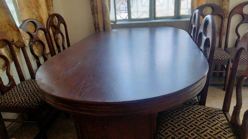 urgent sale of wood dining table with 8 chairs 5