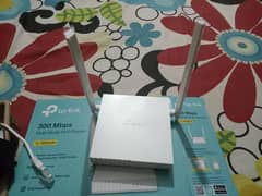 Neat and clean Tp Link Router with complete Box and charger