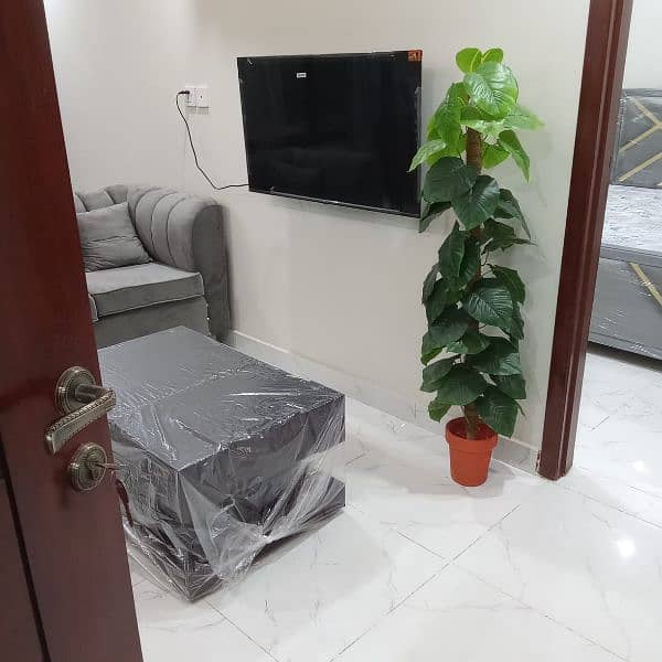 one bed room fully furnished apartment TV lunch kichan attach bathroom 9