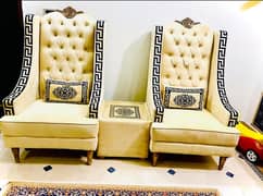 2 comfortable long back chairs and one copper colour dewaan