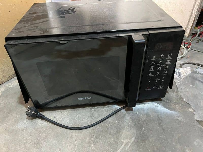 Orient microwave just little bit use only all working 3