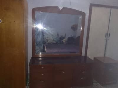 wooden bed and dressing table with extra draw