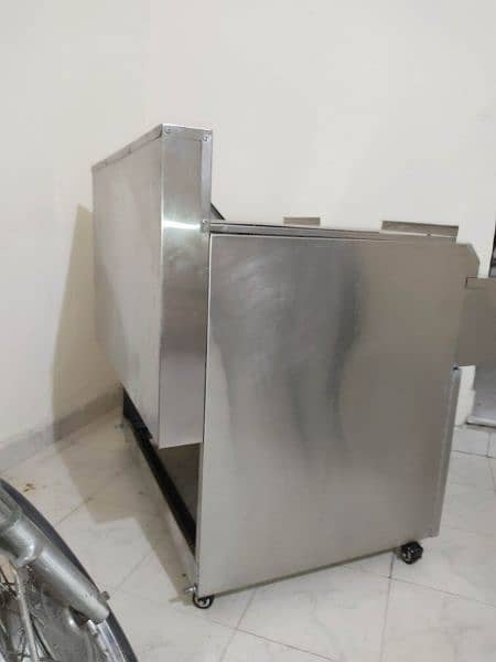 Totally new 16 by 16 litter double side fryer with 3 baskets. 8
