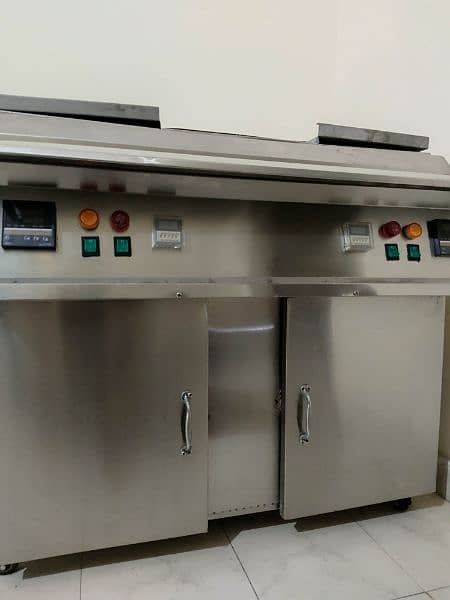 Totally new 16 by 16 litter double side fryer with 3 baskets. 10