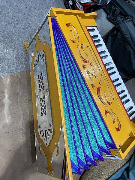 NS ANAND reeds harmonium with camera bellow available 1