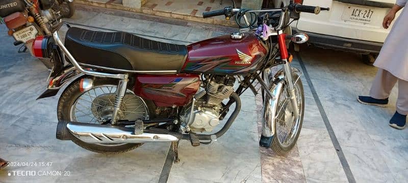 Honda 125, Model 2023 file registration copy wranty card by hand 3