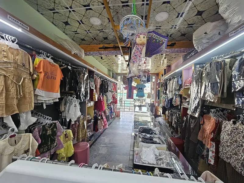 running bussiness garments shop for sale/kids garments shop sale 3