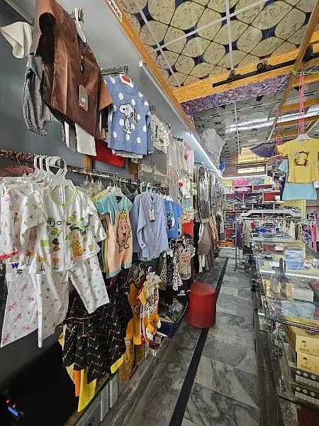 running bussiness garments shop for sale/kids garments shop sale 10