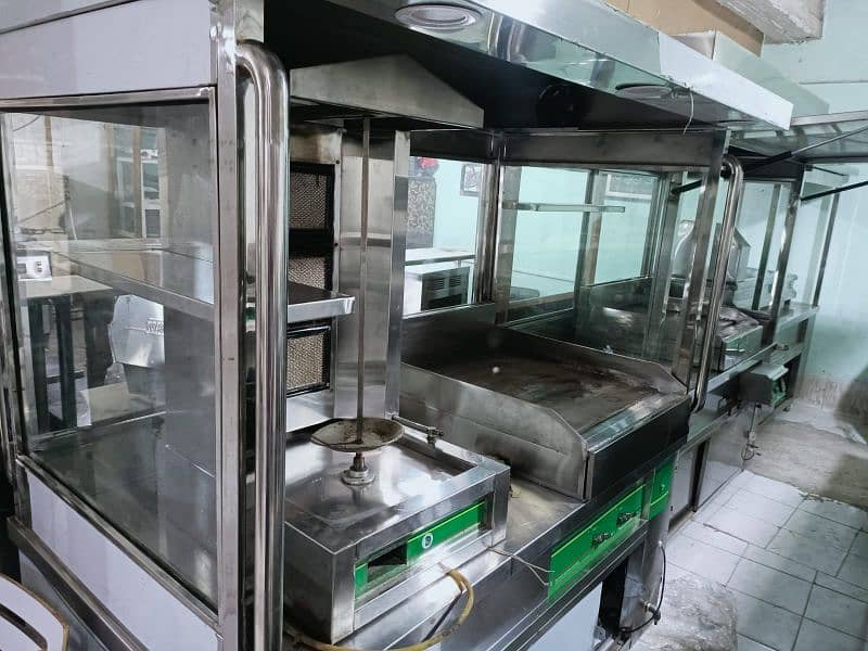 dough mixer 20 ltrs// shawarma counter// proofer// pizza oven// pans 3