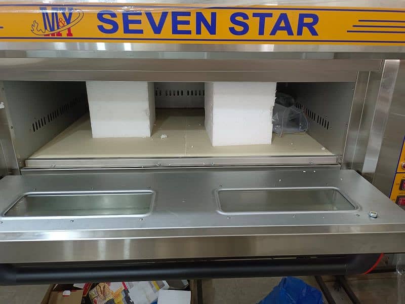 pizza oven//shawarma counters// prep table// fryer// pizza box// pans 2