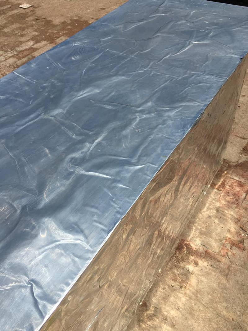 COUNTER FOR SALE COVER WITH METAL WATERPROOF SHEET 1