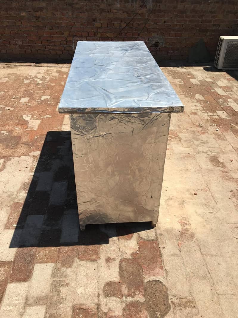 COUNTER FOR SALE COVER WITH METAL WATERPROOF SHEET 3