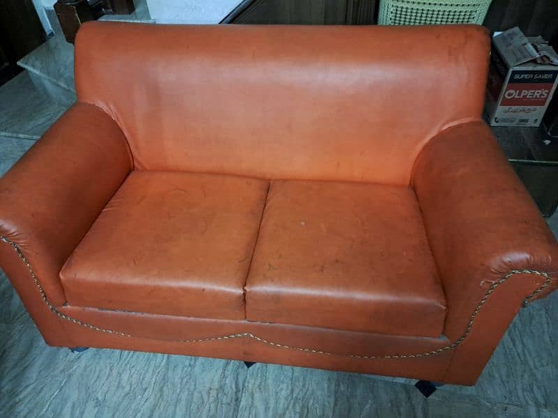2 seater orange color leather sofa 1