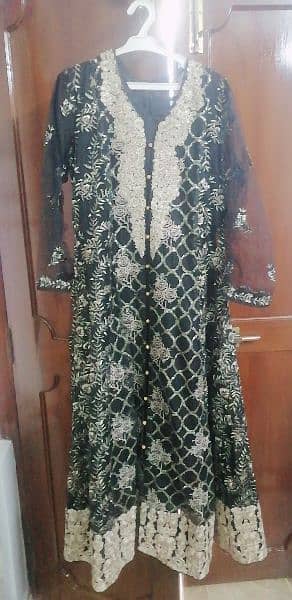 heavy long maxi in black with copper work and silk inner 0