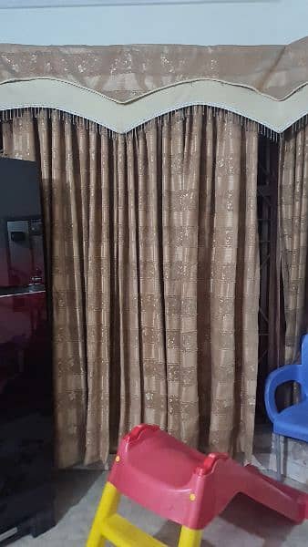 curtains . New condition.  8 curtains 5