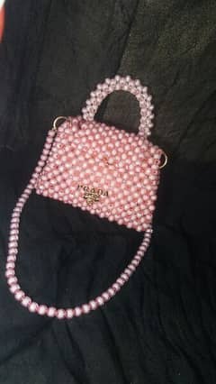 baby pink beaded bag