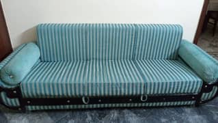 1 sofa cum bed and 1 table