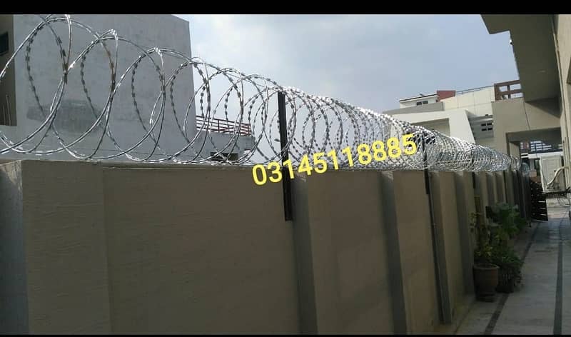 Khawaja: Concertina Barbed wire, Chainlink Fence, Razor Wire 6