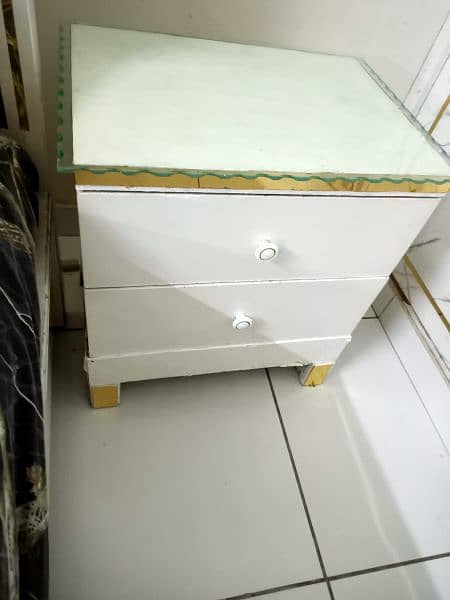 side table of bed 2 brandnew pure wood with deco paint each price 3500 3