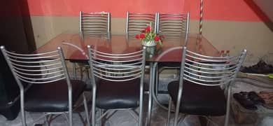 Dining table with 6 leather chairs