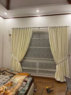 Spacial curtains with net rolling blinds