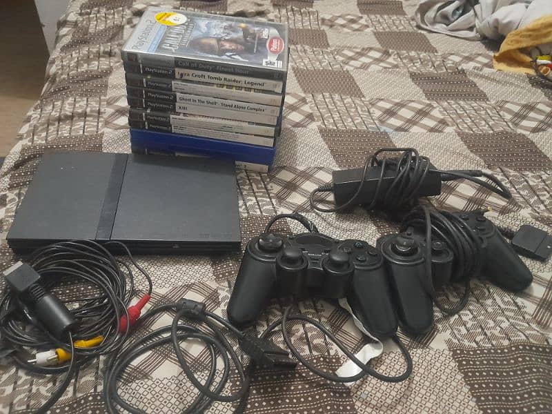 Ps2 used with 10 cds 0