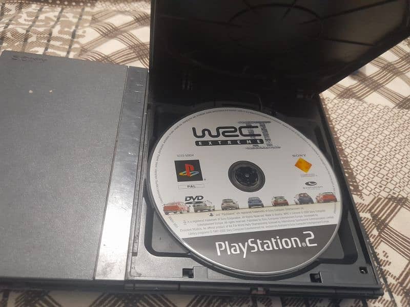 Ps2 used with 10 cds 4