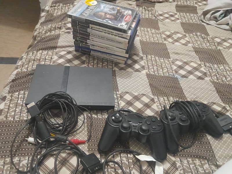 Ps2 used with 10 cds 6