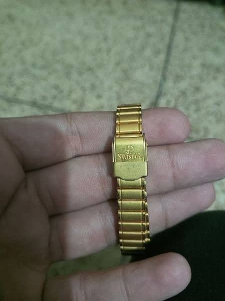swistar 22 k gold plated watch. 1