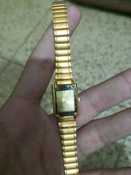 swistar 22 k gold plated watch. 2
