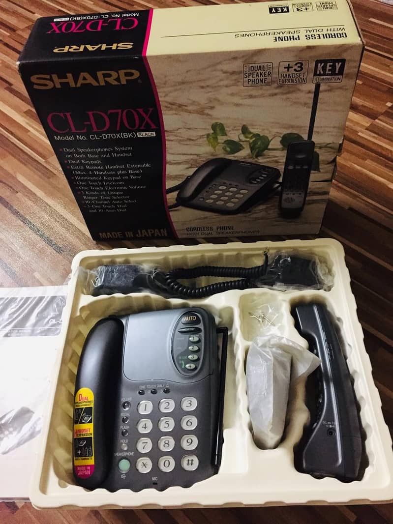 Sharp cordless phone made in japan new set with box and all accessorie 1