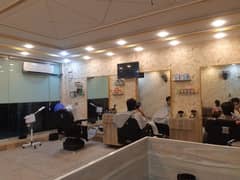 Running salon near UCP hot location for sale with all props and assets