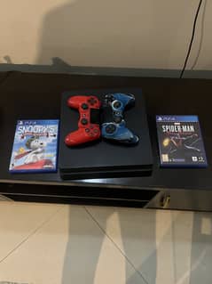 Play Station 4 with 2 games discs