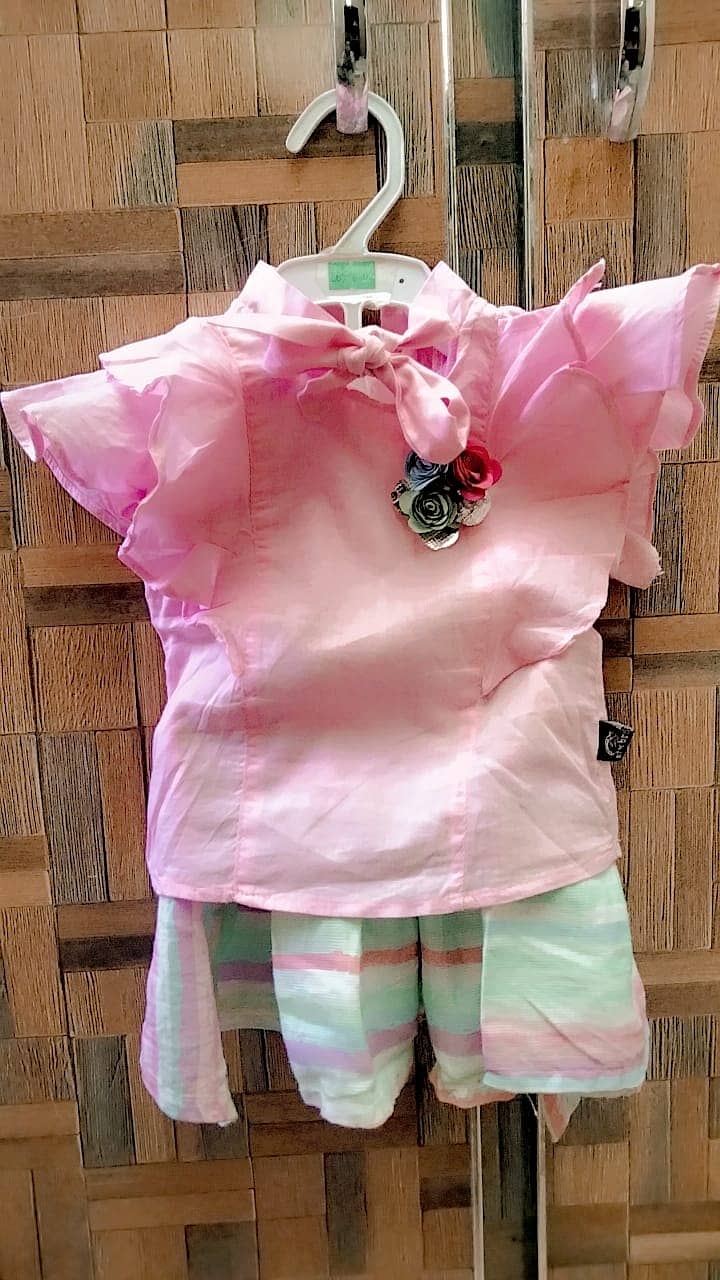 Baby girl dresses. . . age 6 to 9 months 11