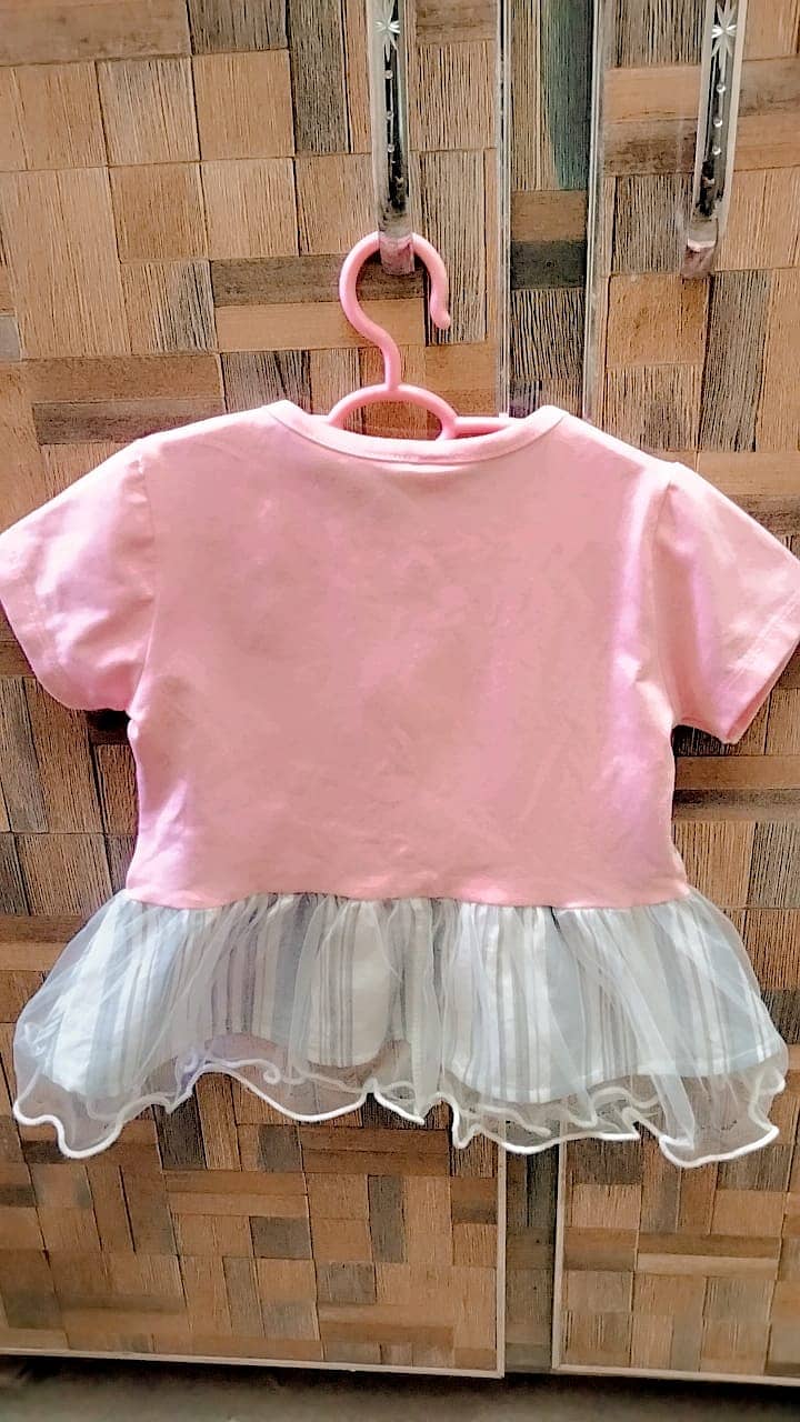 Baby girl dresses. . . age 6 to 9 months 1
